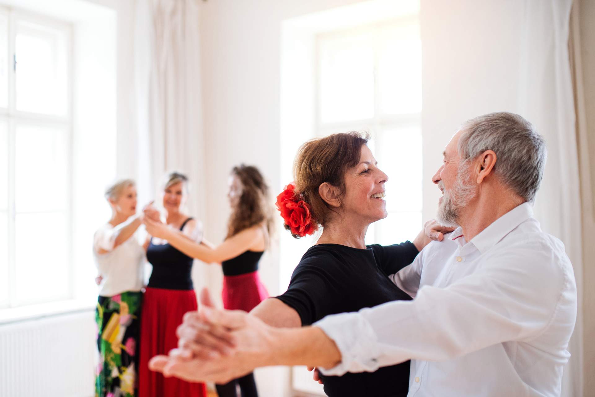 A group of seniors in a dance class.