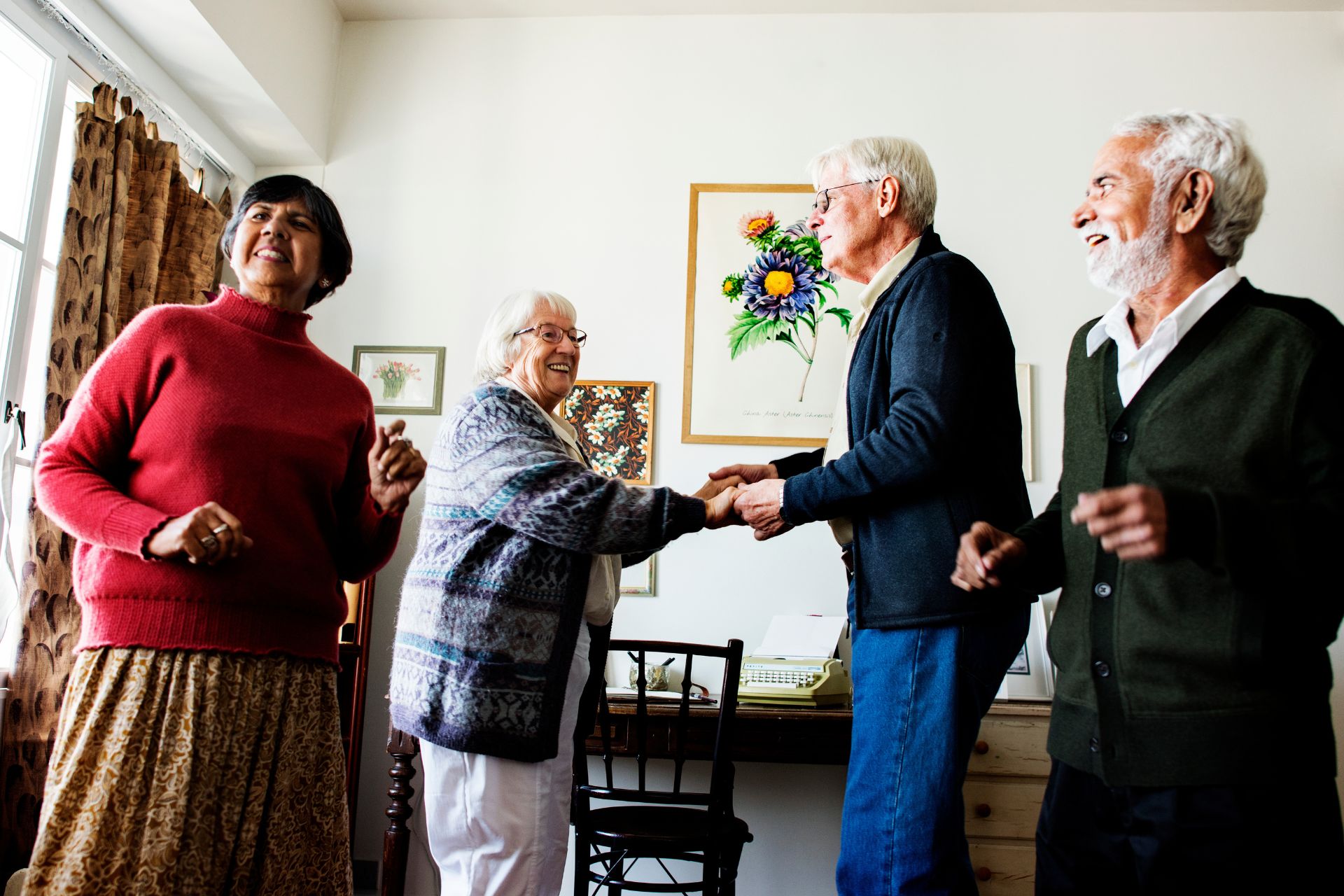 A group of seniors dancing together.